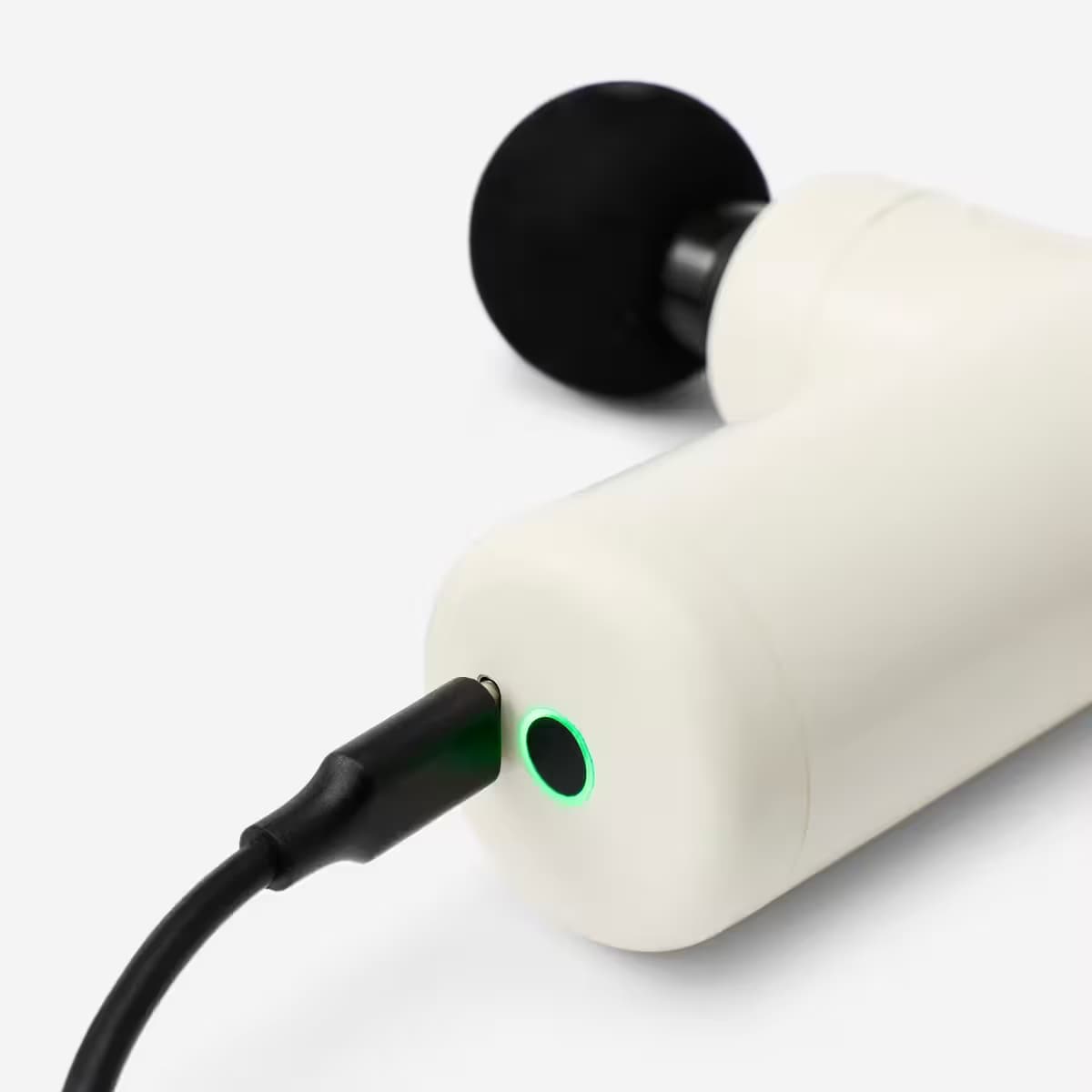 Decathlon Masážní mini pistole - nabíjení